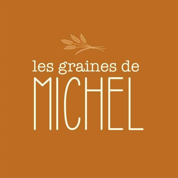 Texte blanc "les graines de MICHEL" avec gerbe de blé, fond marron.